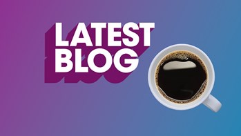 Reads 'latest blog' with a pink to blue face background and a coffee cup